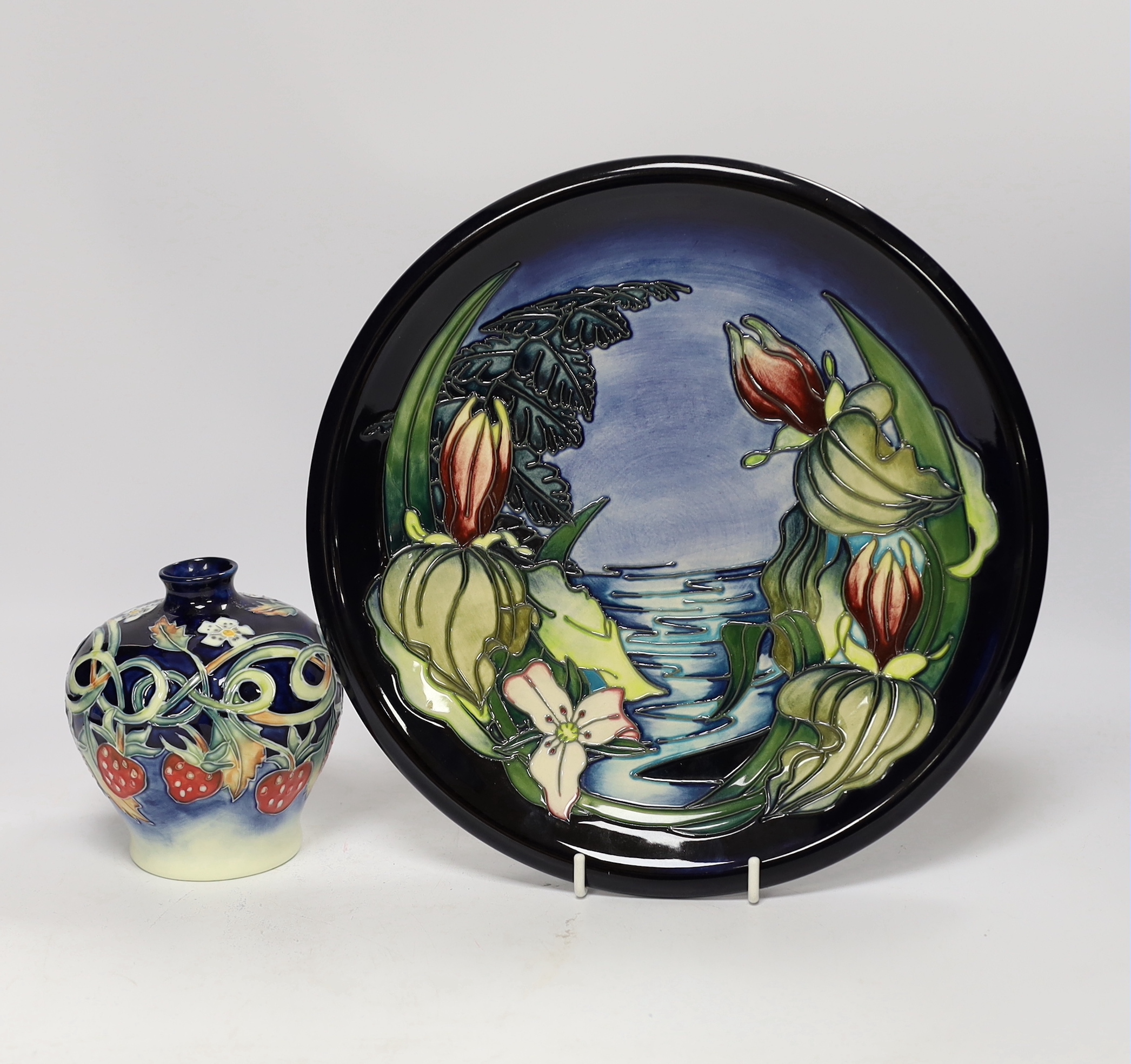 A Moorcroft Sweet Betsy plate and a Jeanne McDougall small vase, plate 26cm diameter